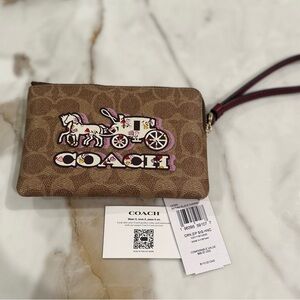 Coach Brown Wristlet with Pink and White Design
